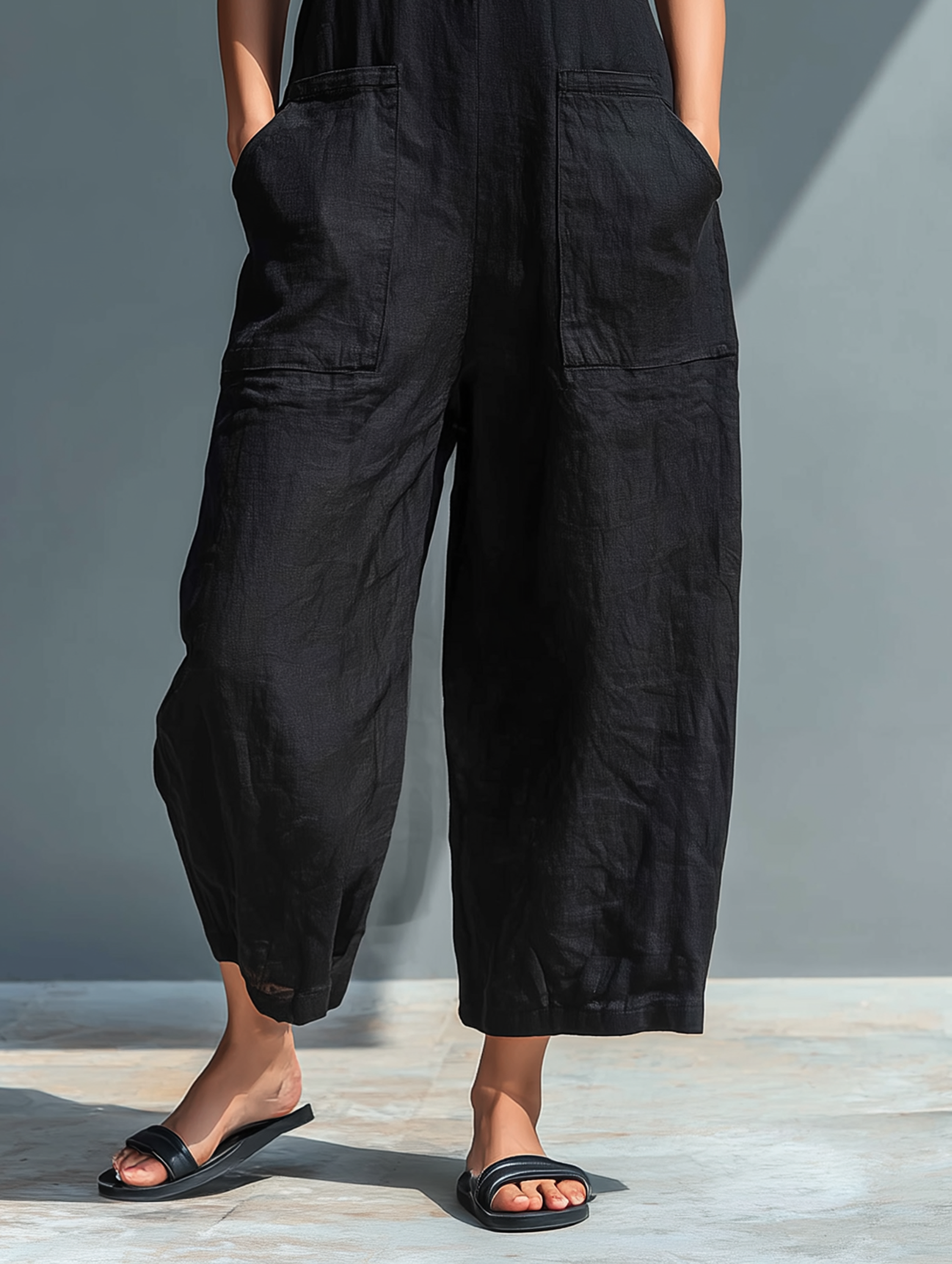 MORGAN | Sleeveless jumpsuit with high collar